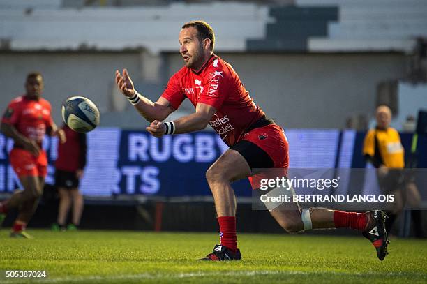 Toulon's French fly-half Frederic Michalak makes a pass during the European Champions Cup rugby union match RC Toulon vs Wasps on January 17, 2016 at...