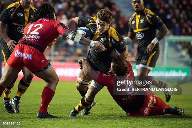 Wasps' English flanker Sam Jones vies with RC Toulon's New Zealander centre Maa Nonu and RC Toulon's South African Number Eight Duane Vermeulen...