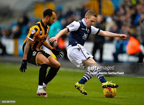 Shane Ferguson of Millwall FC and Byron Moore of Port Vale in action during the Sky Bet League One match between Millwall and Port Vale on January...