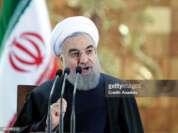 Iranian President Hassan Rouhani gives a speech during a press conference in Tehran, Iran on January 17, 2016. Yesterday, international sanctions on...