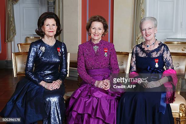 Picture taken on January 17, 2016 at the Royal Castle in Oslo shows Queen Silvia of Sweden, Queen Sonja of Norway and Queen Margrethe of Denmark on...