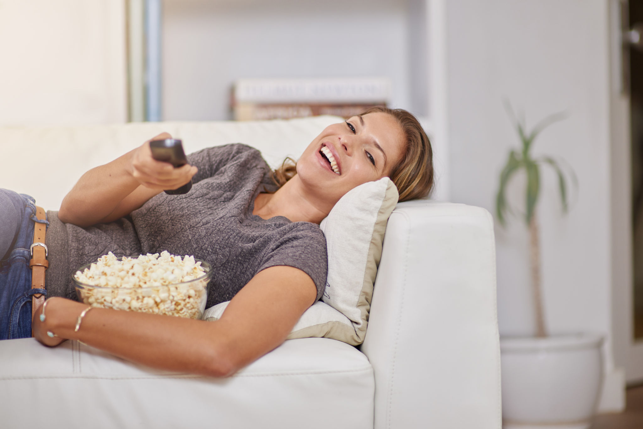 Kicking back with a comedy on the couch Kicking back with a comedy on the couch