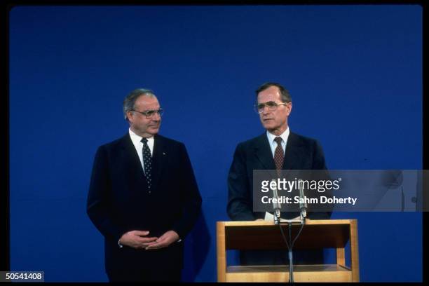 West German Chancellor Helmut Kohl and US Vice President George Bush at press conference.