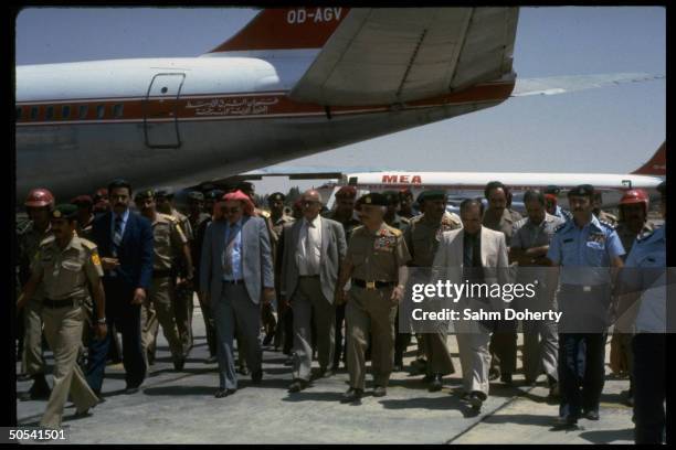 Jordan's King Hussein w. Other officials at welcoming ceremony for Palestinian soldiers upon their arrival at Mafrag Base after evacuation fr....