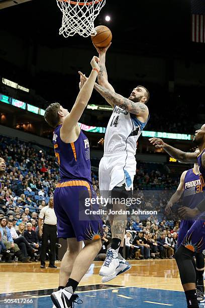 Nikola Pekovic of the Minnesota Timberwolves goes for the layup during the game against the Phoenix Suns on January 17, 2016 at Target Center in...