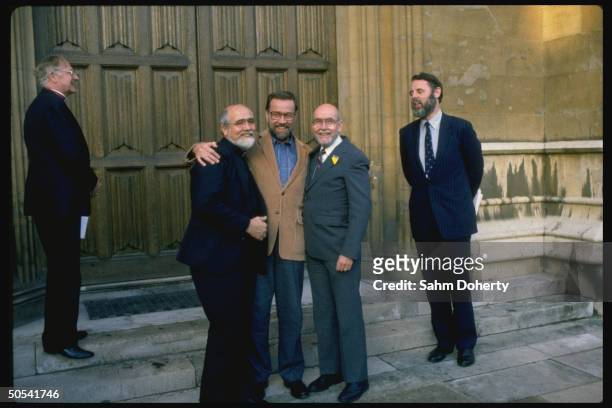 Former hostages Rev. Ben Weir , Rev. Lawrence Jenco and David Jacobsen standing near Anglican church envoy/hostage negotiator Terry Waite and...