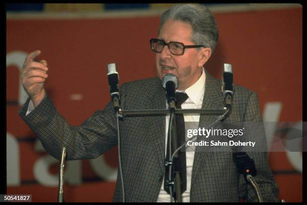 Hans Jochen Vogel, Social Democratic Party candidate for Chancellor, speaking into microphones at rally during his campaign.