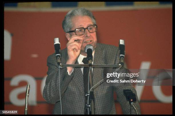 Hans Jochen Vogel, Social Democratic Party candidate for Chancellor, speaking into microphones at rally during his campaign.