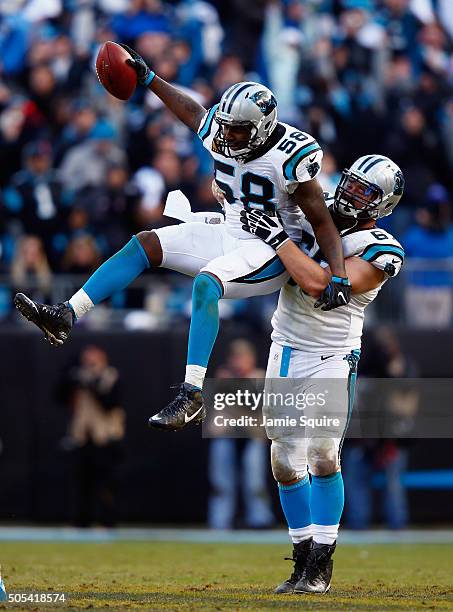 Thomas Davis and teammate Ryan Kalil of the Carolina Panthers celebrate an onside kick recovery against the Seattle Seahawks in the 4th quarter...