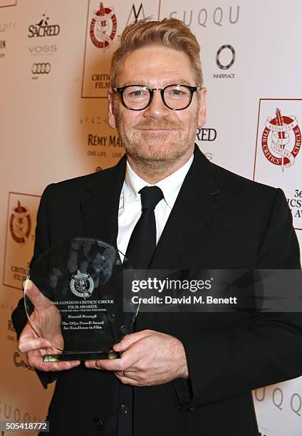 Sir Kenneth Branagh, winner of the Dilys Powell Award for Excellence in Film, poses in front of the Winners Boards at The London Critics' Circle Film...