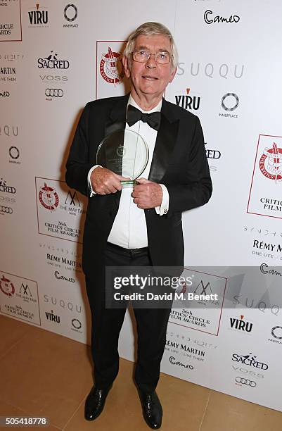 Sir Tom Courtenay, winner of the Actor of the Year award for "45 Years", poses in front of the Winners Boards at The London Critics' Circle Film...
