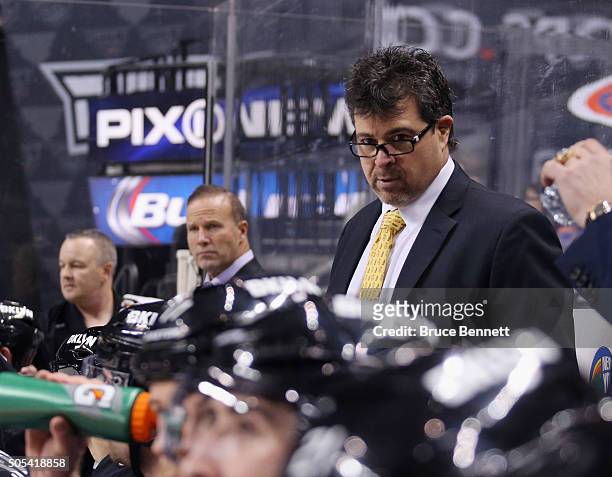 Head coach Jack Capuano of the New York Islanders works the bench against the Vancouver Canucks at the Barclays Center on January 17, 2016 in the...