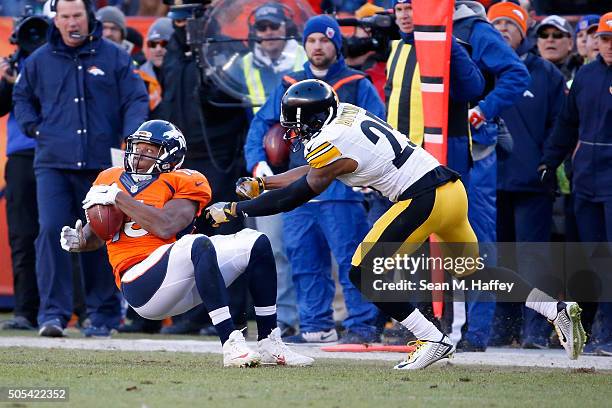 Emmanuel Sanders of the Denver Broncos has a catch under coverage by Brandon Boykin of the Pittsburgh Steelers during the AFC Divisional Playoff Game...