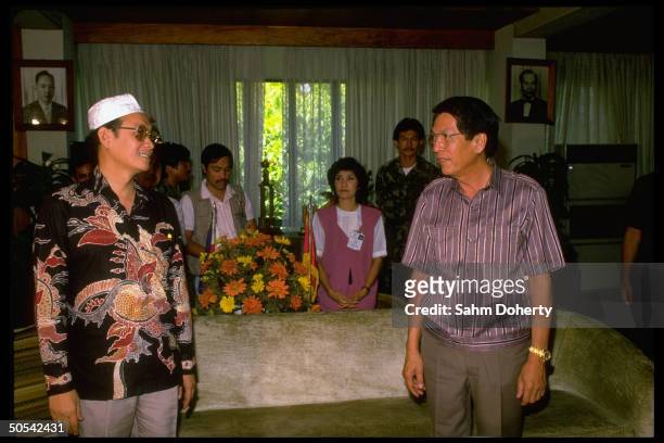 Philippines Defense Minister Juan Ponce Enrile meeting with Macapanto Abbas, leader of Muslim Guerillas.