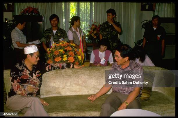 Philippines Defense Minister Juan Ponce Enrile meeting with Macapanto Abbas, leader of Muslim Guerillas.