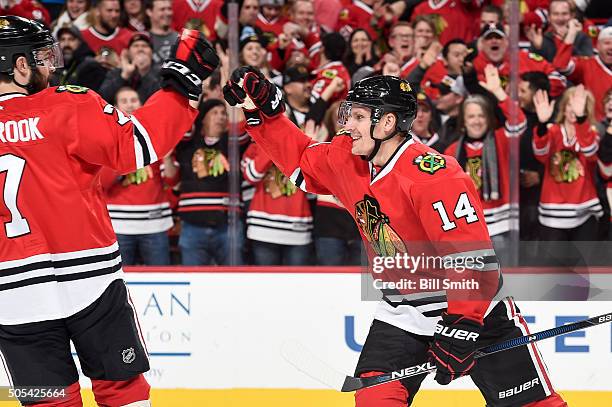 Richard Panik of the Chicago Blackhawks celebrates after scoring against the Montreal Canadiens in the first period of the NHL game at the United...