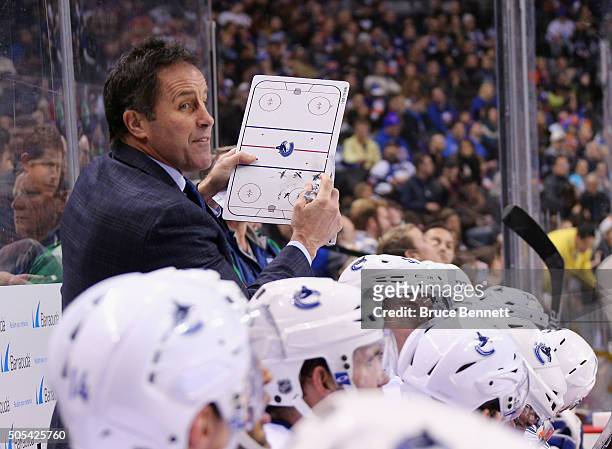 Assistant coach Doug Lidster give players instructions during the third period against the New York Islanders at the Barclays Center on January 17,...