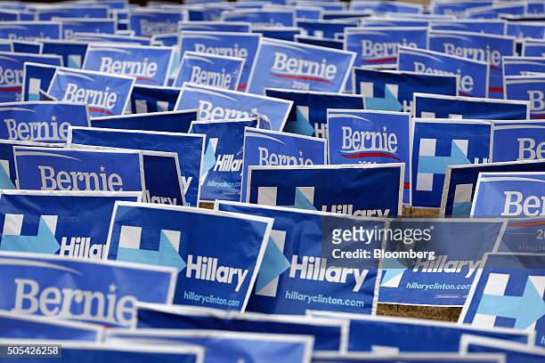 Campaign signs for senator Bernie Sanders, an independent from Vermont and 2016 Democratic presidential candidate, not pictured, and Hillary Clinton,...