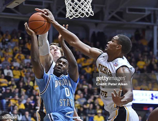 Forward Anton Grady of the Wichita State Shockers blocks the shot of guard Everett Clemons of the Indiana State Sycamores during the second half on...