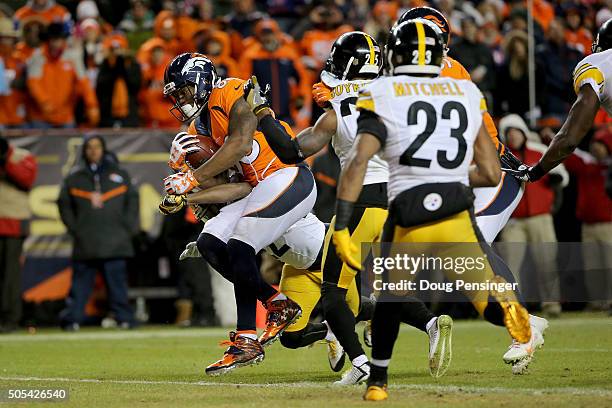 Demaryius Thomas of the Denver Broncos scores the two point conversion in the fourth quarter against the Pittsburgh Steelers during the AFC...