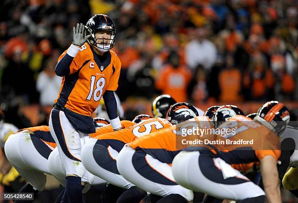 Peyton Manning of the Denver Broncos calls a play against the Pittsburgh Steelers during the AFC Divisional Playoff Game at Sports Authority Field at...