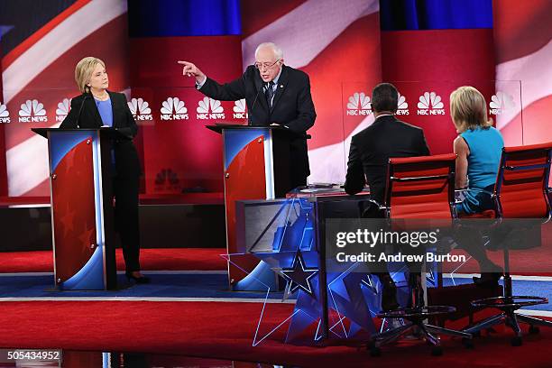 Democratic presidential candidates Hillary Clinton and Senator Bernie Sanders field questions from moderators Lester Holt and Andrea Mitchell during...