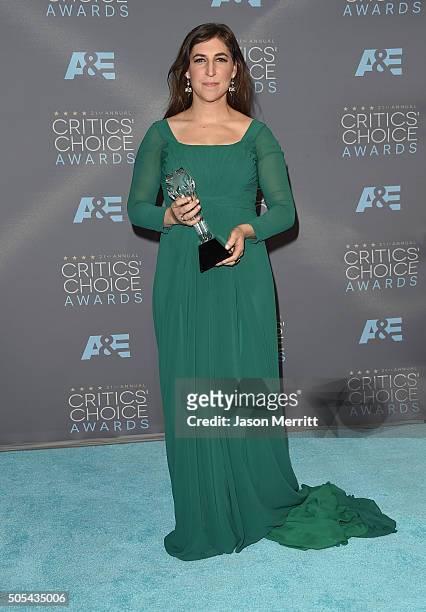 Actress Mayim Bialik, winner of Best Supporting Actress for 'The Big Bang Theory', poses in the press room during the 21st Annual Critics' Choice...