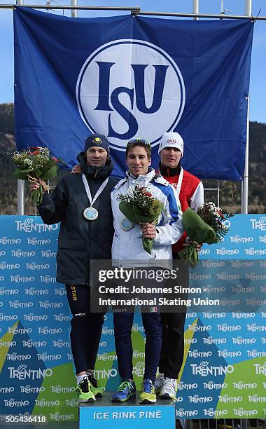 Francesco Tescari of Italy, Stanislav Palkin of Kazakhstan and Ignat Golovatsyuk of Belarus pose during the flower ceremony after winning the men...