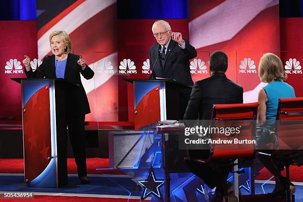 Democratic presidential candidates Hillary Clinton and Senator Bernie Sanders field questions from moderators Lester Holt and Andrea Mitchell during...