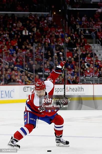 Aaron Ness of the Washington Capitals takes a shot on goal against the New York Rangers at Verizon Center on January 17, 2016 in Washington, DC.