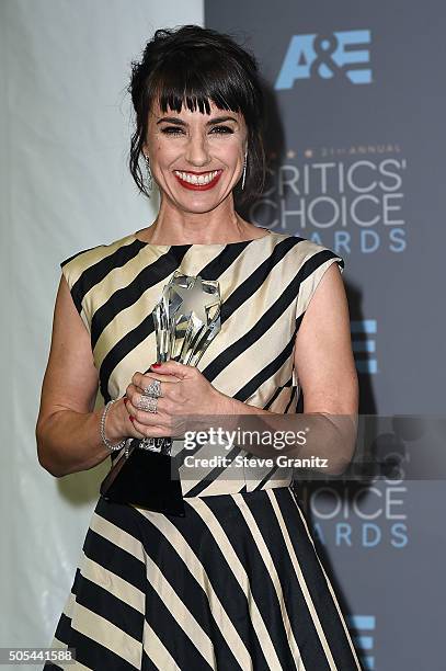 Actress Constance Zimmer, winner of the award for Best Supporting Actress in a Drama Series for "Unreal," poses in the press room during the 21st...