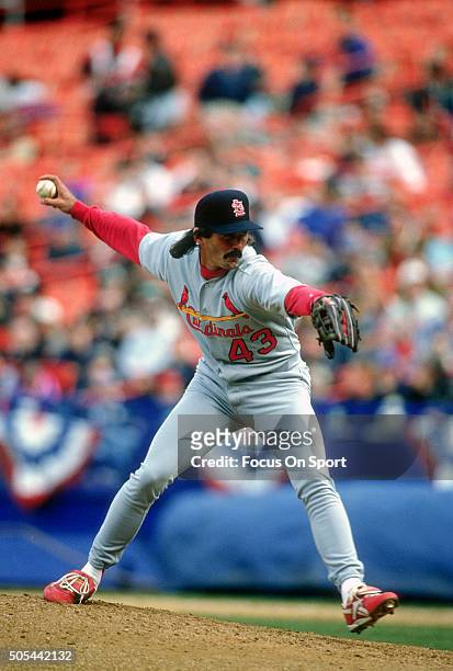Pitcher Dennis Eckersley of the St. Louis Cardinals pitches against the New York Mets during an Major League Baseball game circa 1997 at Shea Stadium...
