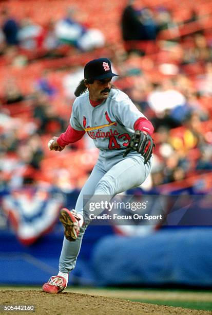 Pitcher Dennis Eckersley of the St. Louis Cardinals pitches against the New York Mets during an Major League Baseball game circa 1997 at Shea Stadium...