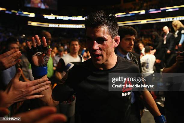 Dominick Cruz greets fans after defeating T.J. Dillashaw to win the World Bantamweight Championship during UFC Fight Night 81 at TD Banknorth Garden...