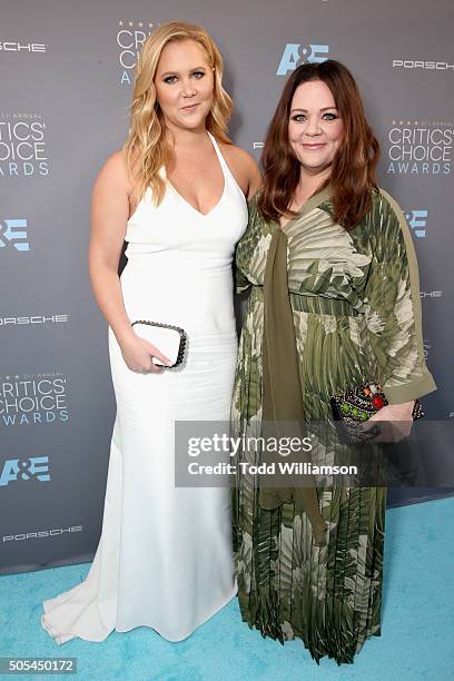 Actresses Amy Schumer and Melissa McCarthy attend the 21st Annual Critics' Choice Awards at Barker Hangar on January 17, 2016 in Santa Monica,...