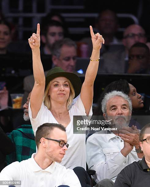 Kaley Cuoco and her father Gary Carmine Cuoco attend a basketball game between the Houston Rockets and the Los Angeles Lakers at Staples Center on...