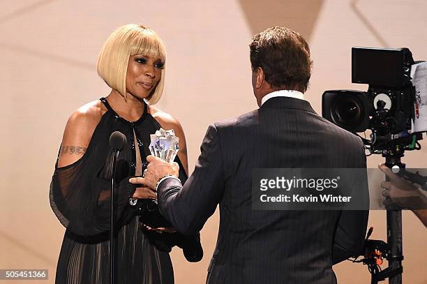 Actor Sylvester Stallone accepts Best Supporting Actor award for 'Creed' from singer Mary J. Blige onstage during the 21st Annual Critics' Choice...