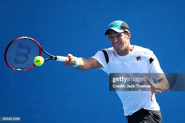 Pablo Andujar of Spain plays a forehand in his first round match against Pierre-Hughes Herbert of France during day one of the 2016 Australian Open...