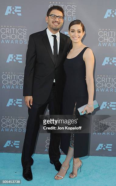 Sam Esmail and fiance Emmy Rossum arrive at The 21st Annual Critics' Choice Awards at Barker Hangar on January 17, 2016 in Santa Monica, California.