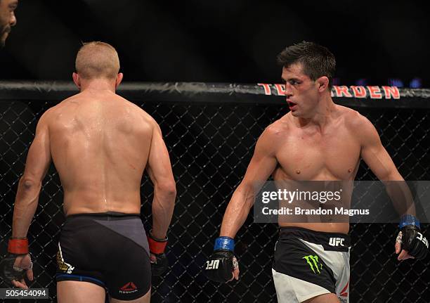 Dominick Cruz stares down TJ Dillashaw during their UFC bantamweight championship bout during the UFC Fight Night event inside TD Garden on January...