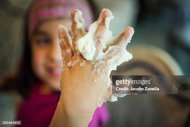 child hand with starch paste - papier stock pictures, royalty-free photos & images