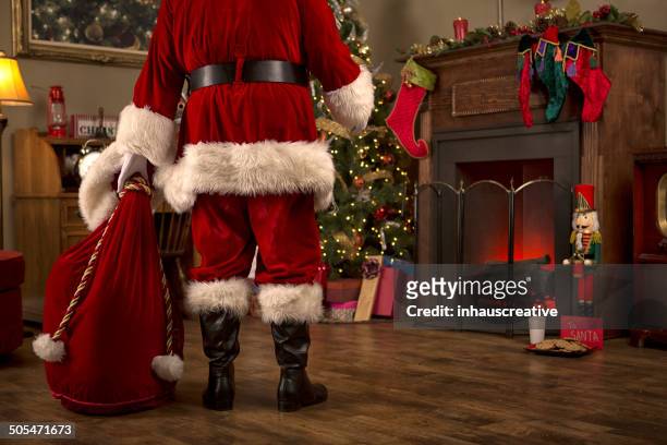 santa enjoying his pipe - santa clause stockfoto's en -beelden