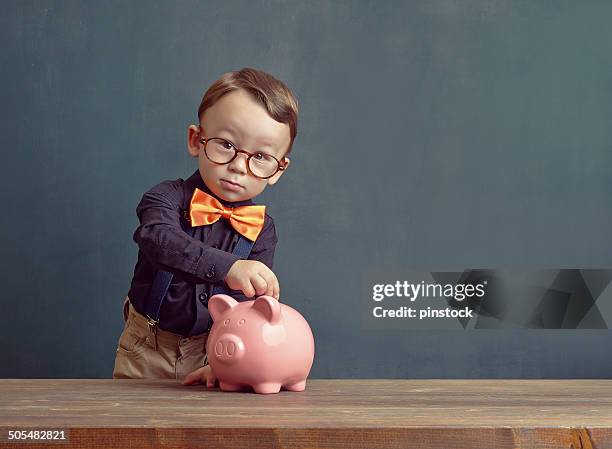 ahorro dinero - kids money fotografías e imágenes de stock