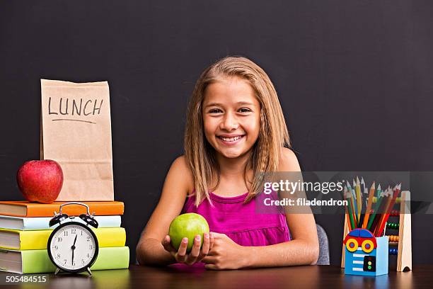 back to school - desk of student alarm clock books and pencils stock pictures, royalty-free photos & images