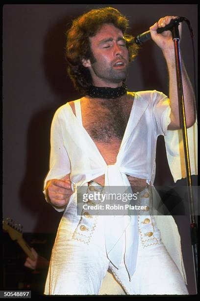 Singer Paul Rodgers of the rock band Bad Company performing in concert.