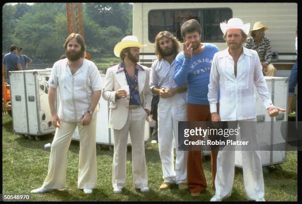 Rock and roll band "The Beach Boys" pose for a portrait backstage of their concert in Central Park on September 1, 1977 in New York City, New York....
