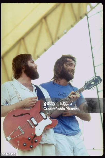Rock and roll band "The Beach Boys" perform in concert in Central Park on September 1, 1977 in New York City, New York.( Carl and Dennis Wilson of...