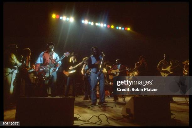 Members of the bands Starz and Foghat and guitarist Johny Winter performing.