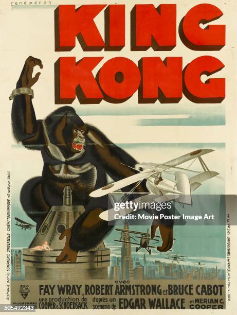 French poster by Rene Peron for the RKO movie 'King Kong', featuring the gigantic ape battling an aircraft atop a skyscraper, 1933.