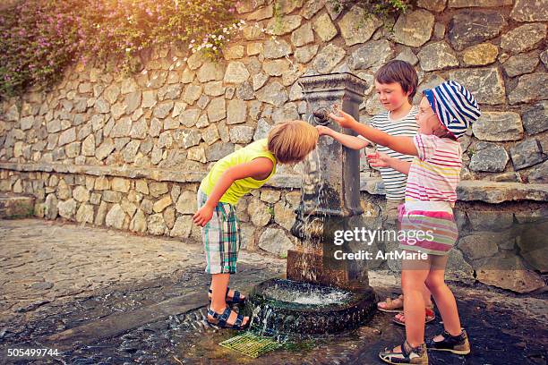 happy in summer - drinking fountain stock pictures, royalty-free photos & images